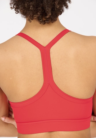 Athlecia Low support Sport bh 'Bloom V2' in Rood