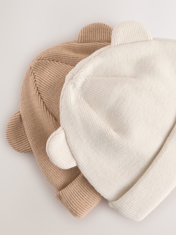 Next Pipo värissä beige