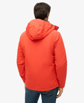 Veste mi-saison Superdry en orange