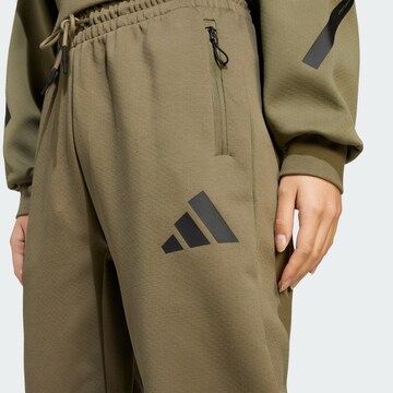 ADIDAS SPORTSWEAR Tapered Sportbroek 'Z.N.E.' in Bruin
