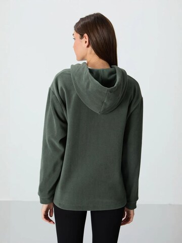 Sweat-shirt Tommy Life en vert