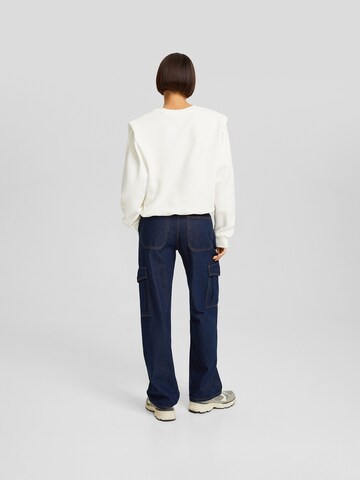 Loosefit Jeans cargo Bershka en bleu