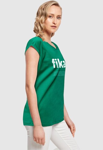 T-shirt 'Fika Definition' Mister Tee en vert