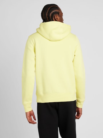 TOMMY HILFIGER - Regular Fit Sweatshirt em amarelo