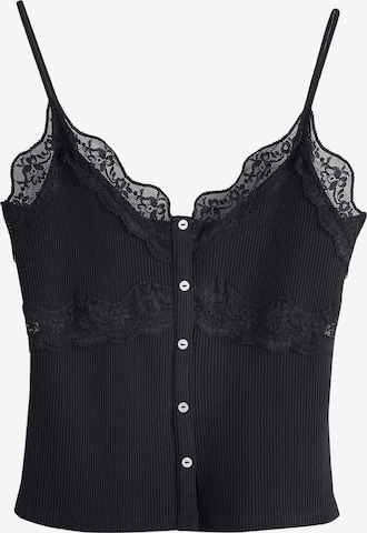 Haut Next en noir : devant