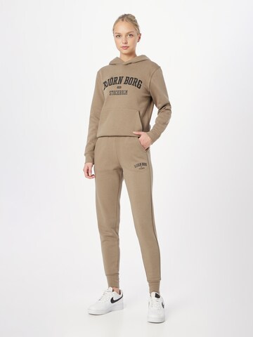 BJÖRN BORG Tapered Sportbroek in Bruin