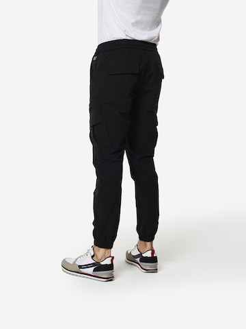 Tapered Jeans cargo di KOROSHI in nero