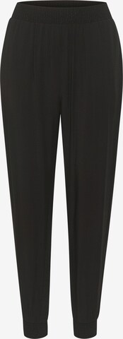 Cream Loose fit Pants in Black: front