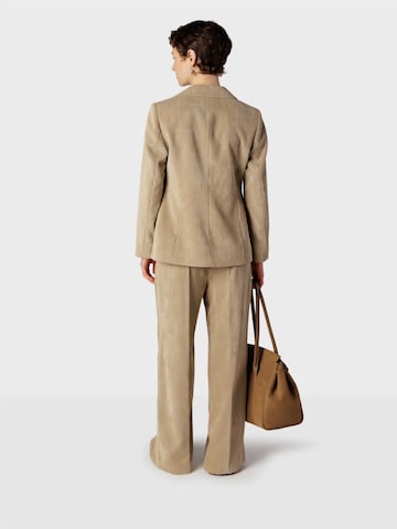 Regular Pantalon à plis ' ' NAULOVER en marron : derrière