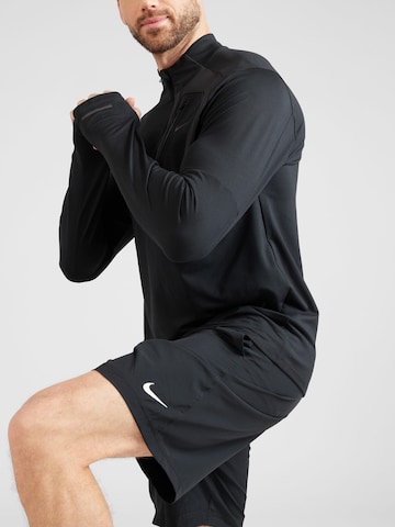 NIKE Regularen Športne hlače 'FORM 9IN' | črna barva
