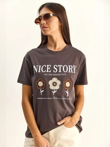 T-shirt 'T-Shirts' Bianco Lucci en marron