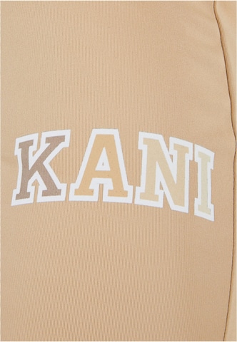Skinny Pantalon de sport Karl Kani en beige