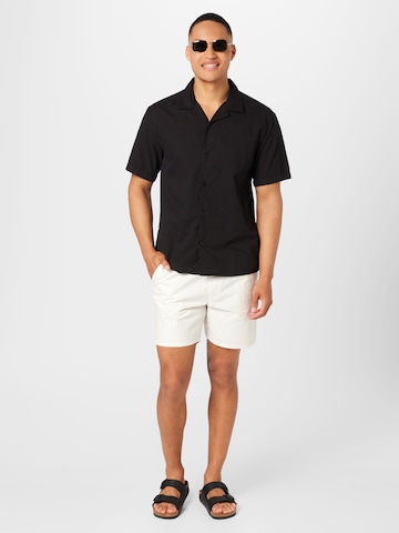 juoda KnowledgeCotton Apparel Standartinis modelis Marškiniai