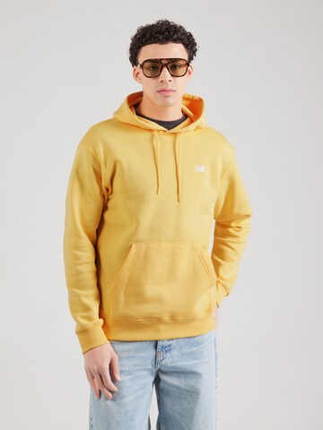Felpa 'Sport Essentials' di new balance in giallo: frontale