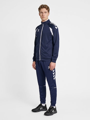 Veste de survêtement Hummel en bleu