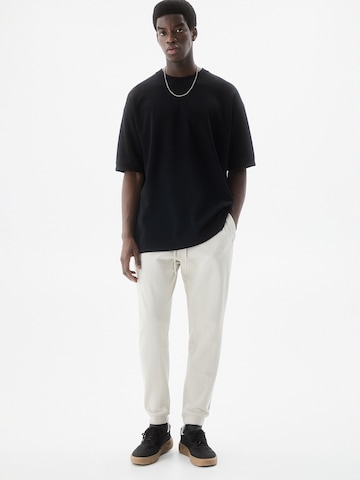 Pull&Bear Tapered Pants in Grey: front