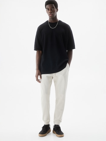 Pull&Bear Tapered Trousers in Grey: front