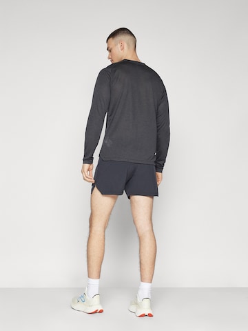 new balance Regular Sports trousers 'RC 5' in Black