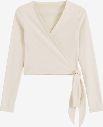 Aim'n - Blusa funcionais em bege: frente