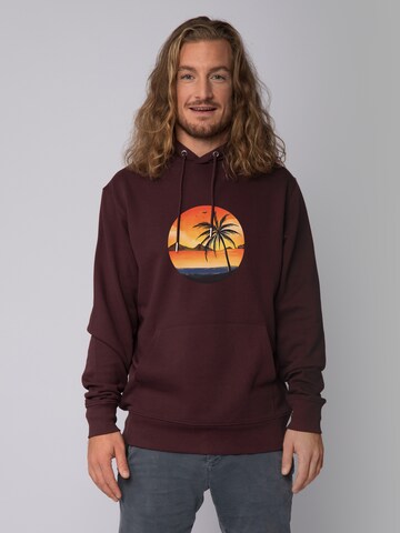 Sweat-shirt Watapparel en rouge : devant