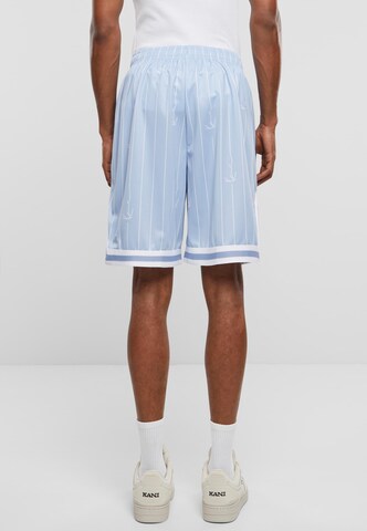 Karl Kani Loose fit Pants in Blue