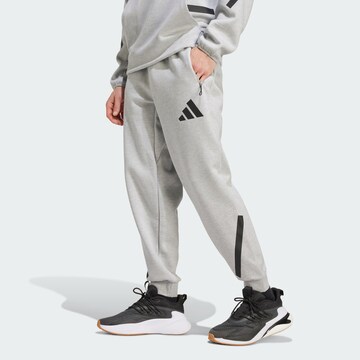 ADIDAS SPORTSWEAR Tapered Παντελόνι φόρμας 'Z.N.E.' σε γκρι: μπροστά