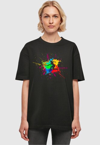 Merchcode Oversized Shirt 'Color Splash Player' in Black: front