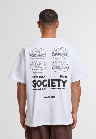 T-Shirt 'Bagel Society' Another Cotton Lab en blanc : devant
