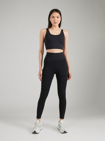 UNDER ARMOUR Skinny Sporthose 'Meridian' in Schwarz