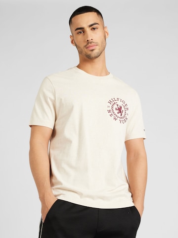 T-Shirt 'ICON CREST' TOMMY HILFIGER en beige : devant