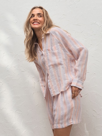 Next Soveskorte i pink: forside