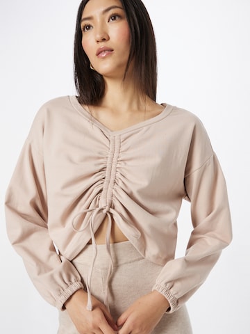 Sweat-shirt 'Marina' ABOUT YOU en beige