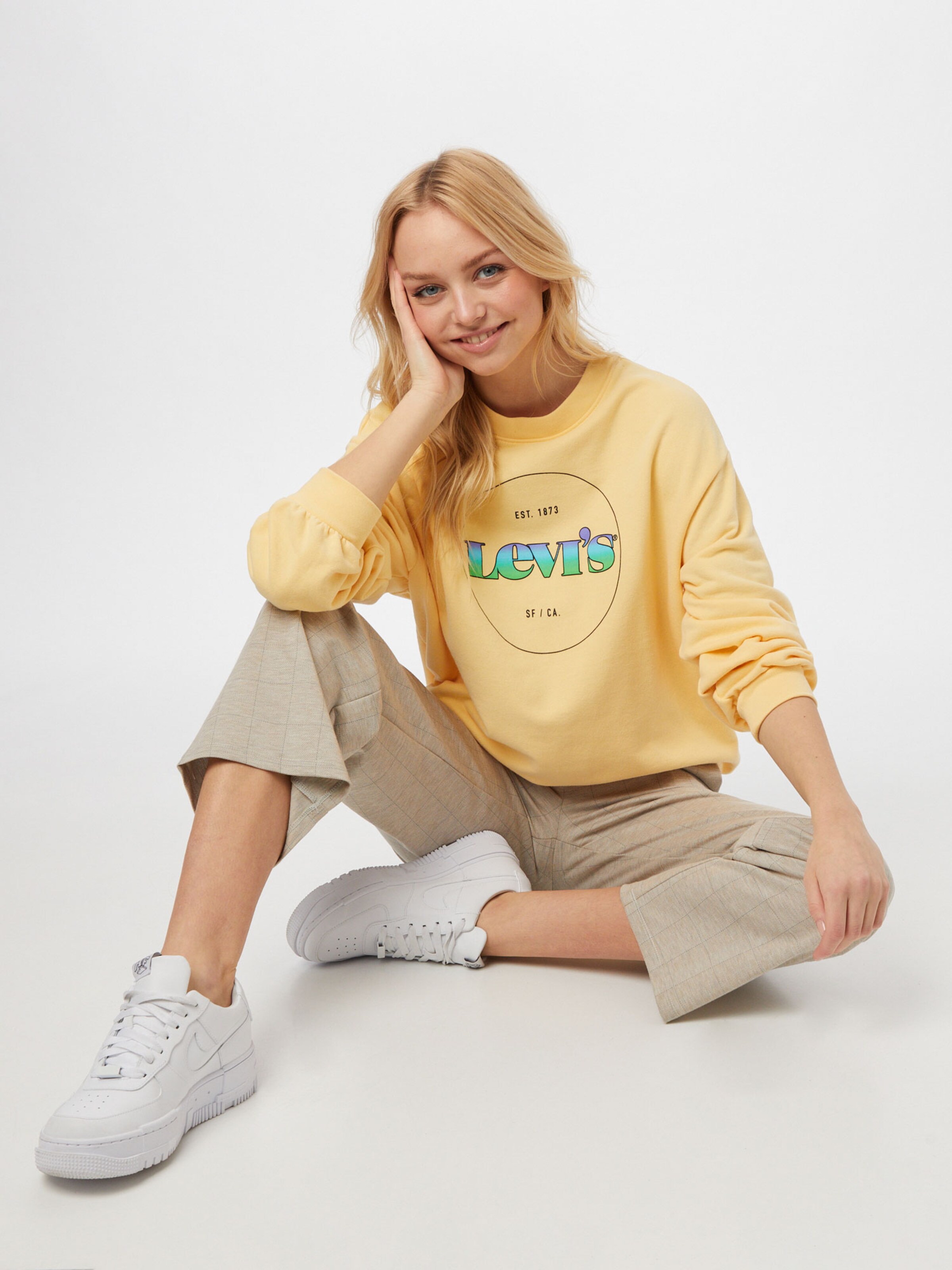 Sweat levis jaune femme sale