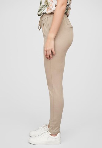 Tapered Pantaloni con pieghe di Cloud5ive in beige