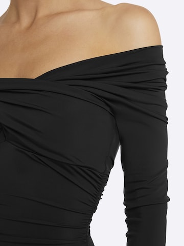 Nicowa Jumpsuit 'FIOLIW' in Zwart