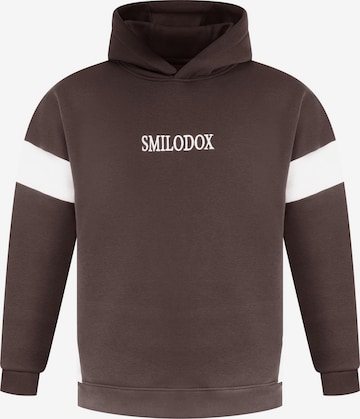 Veste de survêtement 'Jayden' Smilodox en marron : devant