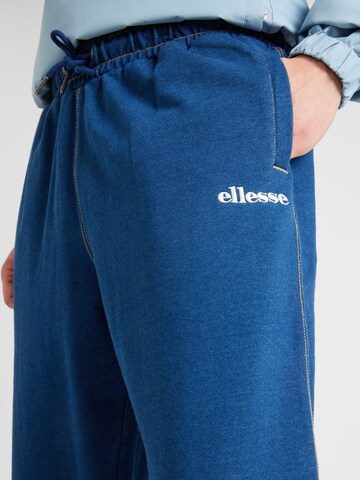 ELLESSE Alt kitsenev Püksid 'Dempsi', värv sinine