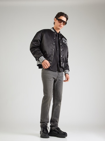 HUGO Slimfit Farkut 'Ash' värissä harmaa