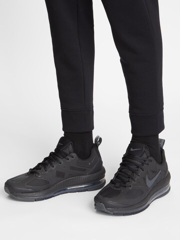 Baskets basses 'Air Max Genome' Nike Sportswear en noir : devant