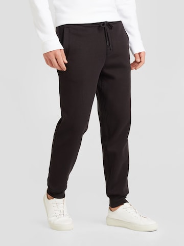 Tapered Pantaloni di Calvin Klein Jeans in nero: frontale