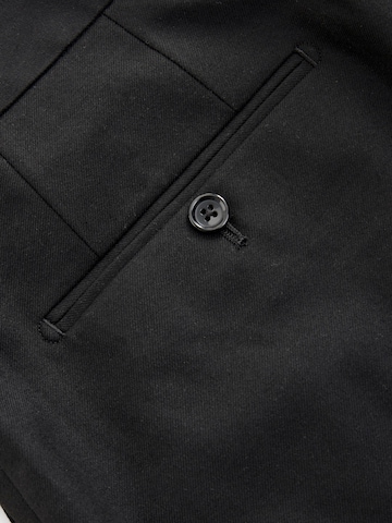Coupe slim Pantalon à plis Next en noir