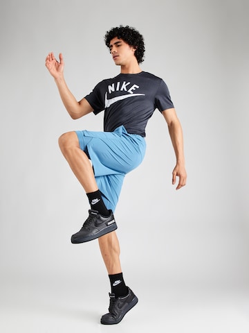 NIKE Regular Sports trousers 'UNLIMITED' in Blue