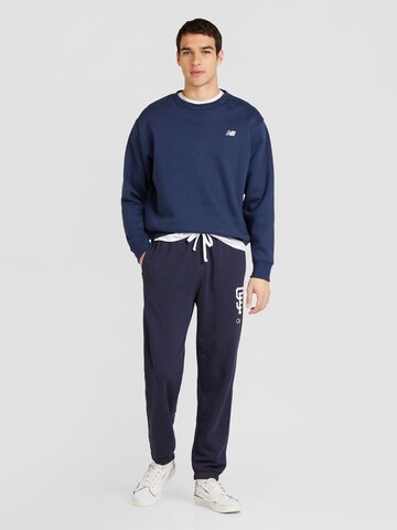 Champion Authentic Athletic Apparel Tapered Trousers 'Elastic' in Blue