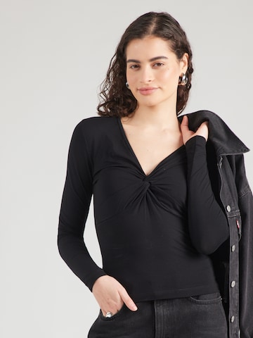 Tricou 'Nathalie' de la ABOUT YOU pe negru: față