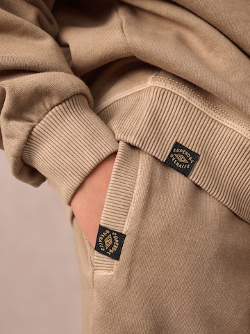 Superdry Joggingdragt i beige