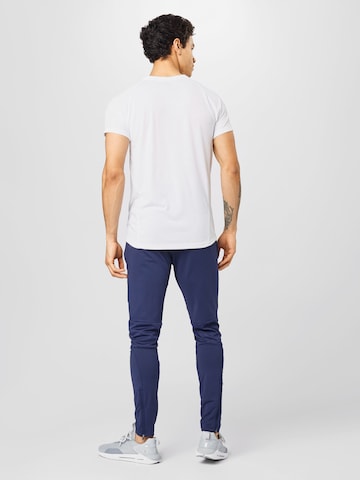 PUMA Slimfit Športne hlače | modra barva