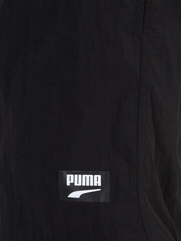 PUMA Regular Badeshorts in Schwarz