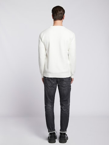 Goldgarn Tapered Jeans i svart