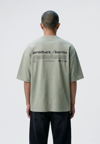 Maglietta 'PRODUCT OF BERLIN' di Vertere Berlin in verde: dietro