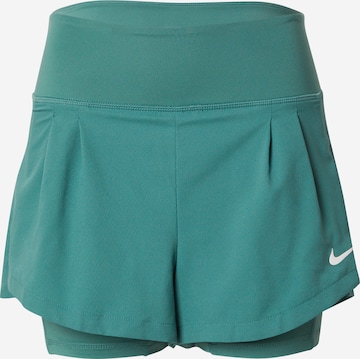 NIKE Regular Sports trousers in Green: front